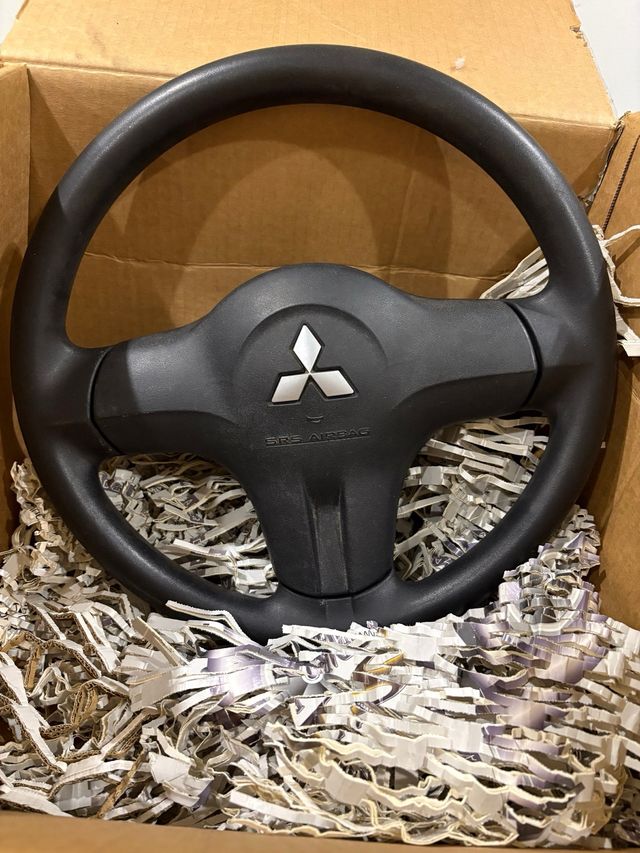 Volante Mitsubishi Colt