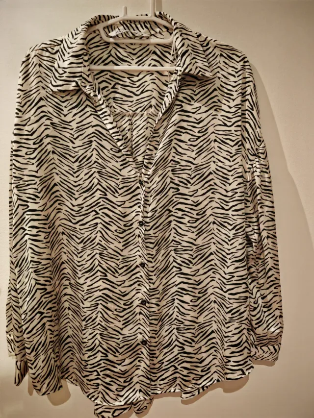 BLUSA OVERSIZE ESTAMPADO ANIMAL