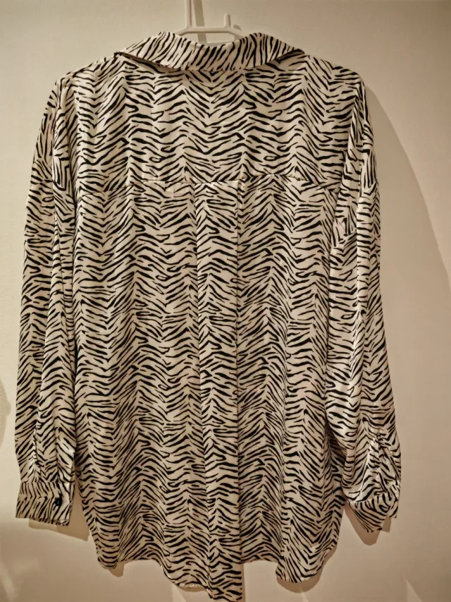 BLUSA OVERSIZE ESTAMPADO ANIMAL