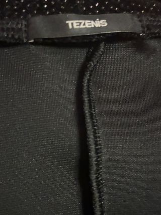 Americana negra con glitter