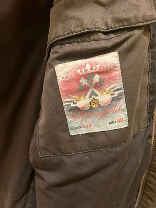 Abrigo marrón con capucha y pelo