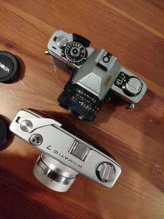 Dos cámaras Minolta reflex y telemétrica