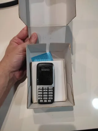 Alcatel OT-E205 Caja Teléfono Móvil