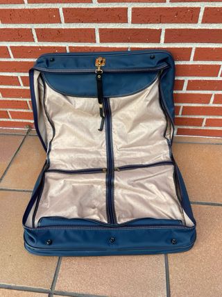 Maletín porta trajes Samsonite azul y dorado