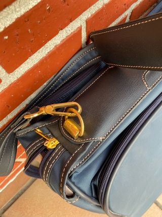 Maletín porta trajes Samsonite azul y dorado