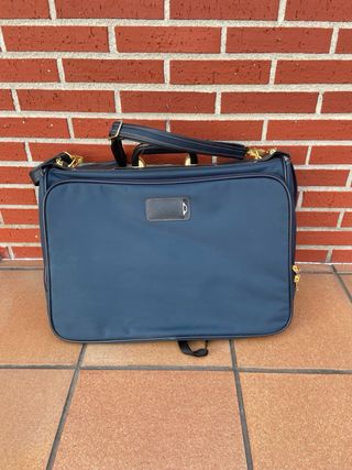 Maletín porta trajes Samsonite azul y dorado