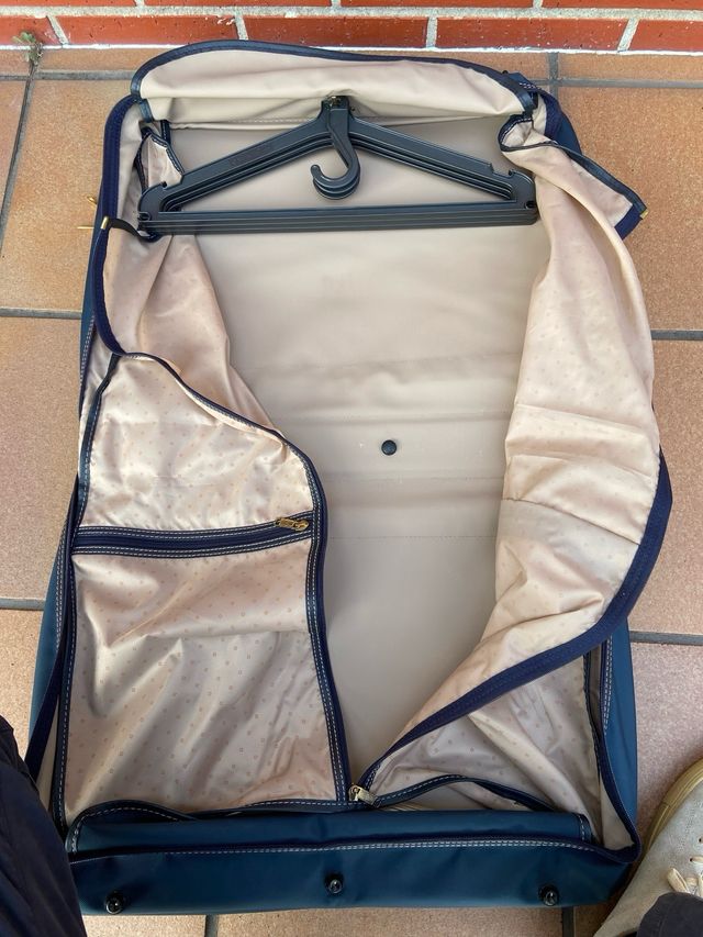 Maletín porta trajes Samsonite azul y dorado