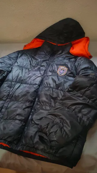 Plumífero Negro y Naranja