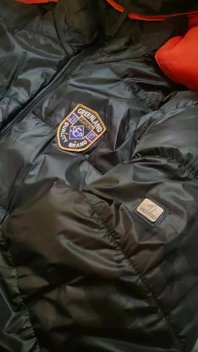 Plumífero Negro y Naranja