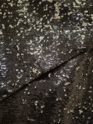 Falda corta lentejuelas negra y blanca