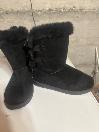 Stivali neri con pelliccia