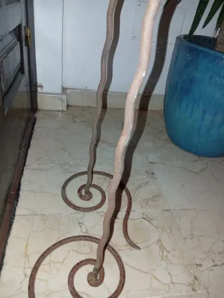 Candelabri in ferro battuto con candele