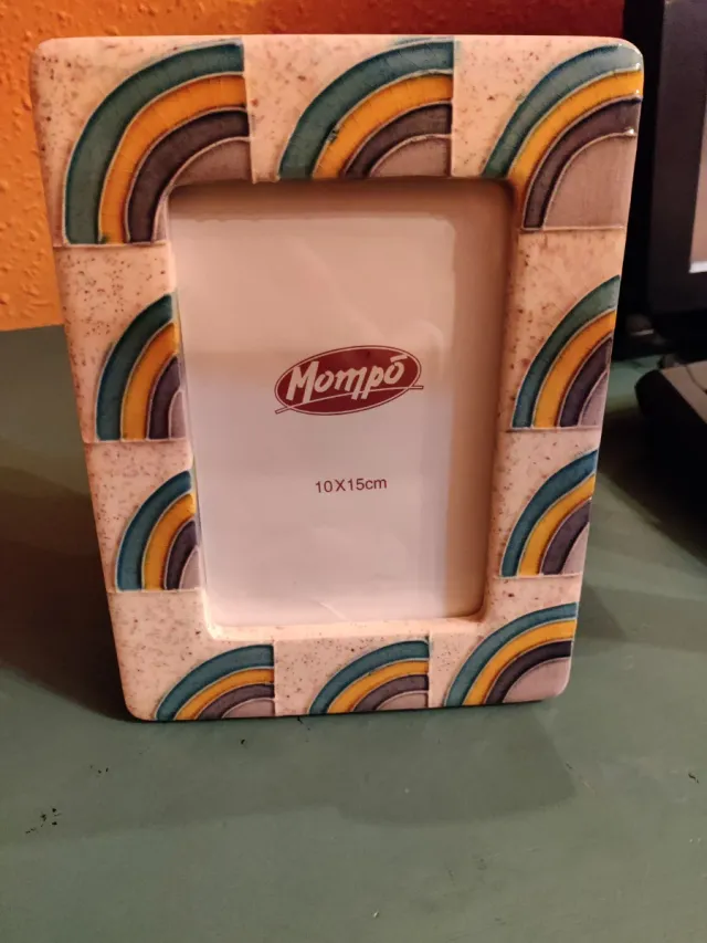 Figura niño y marco fotos decorativo