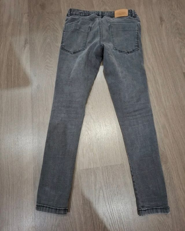 Vaqueros negros niña