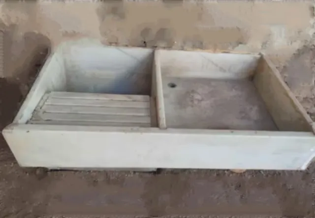 Pica de cocina antigua de mármol