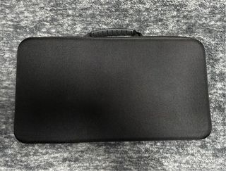 Pistola de masajes con maletín