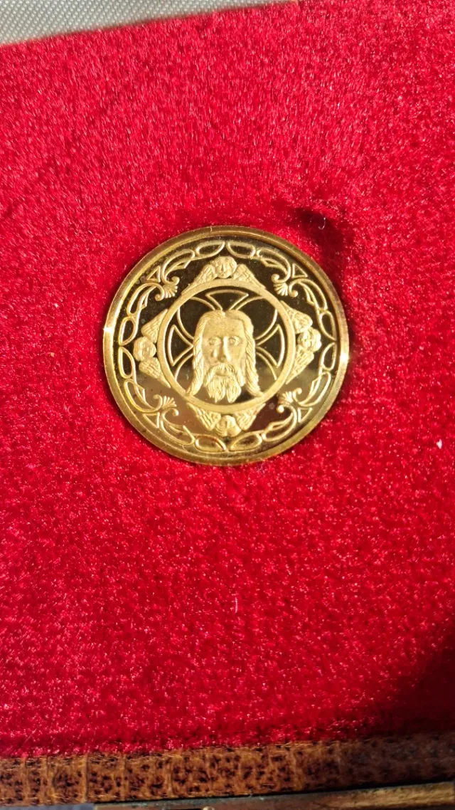 Moneda de Oro Santa Faz