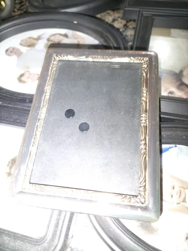 Marcos de fotos negros y plateados