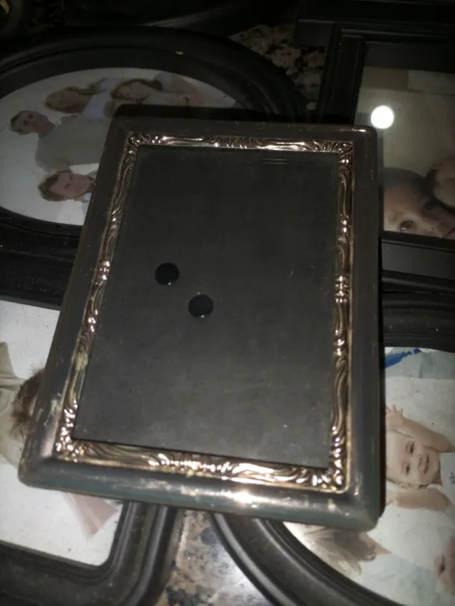 Marcos de fotos negros y plateados