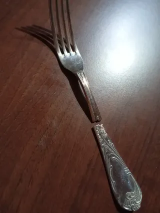 Forchetta argento rotta