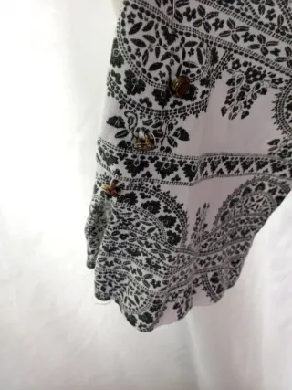 Blusa estampada manga larga