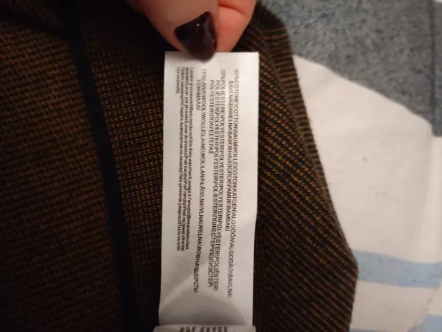 Maglione uomo marrone con dettagli neri