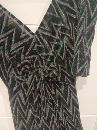 Mono fiesta negro y plateado