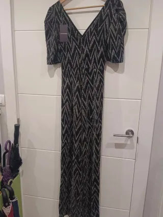 Mono fiesta negro y plateado