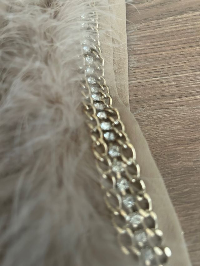 Minigonna piume foderata