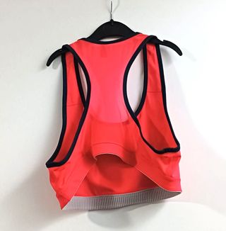 Top deportivo Puma fucsia talla L