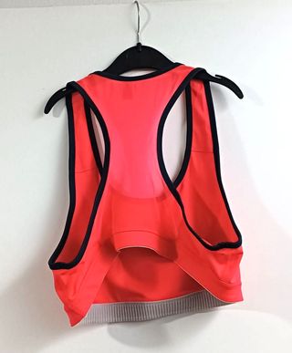 Top deportivo Puma fucsia talla L