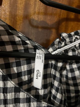 Blusa cuadros con volante