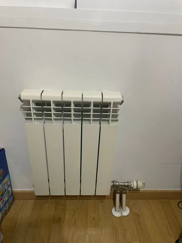 Fontanero, calefactor.