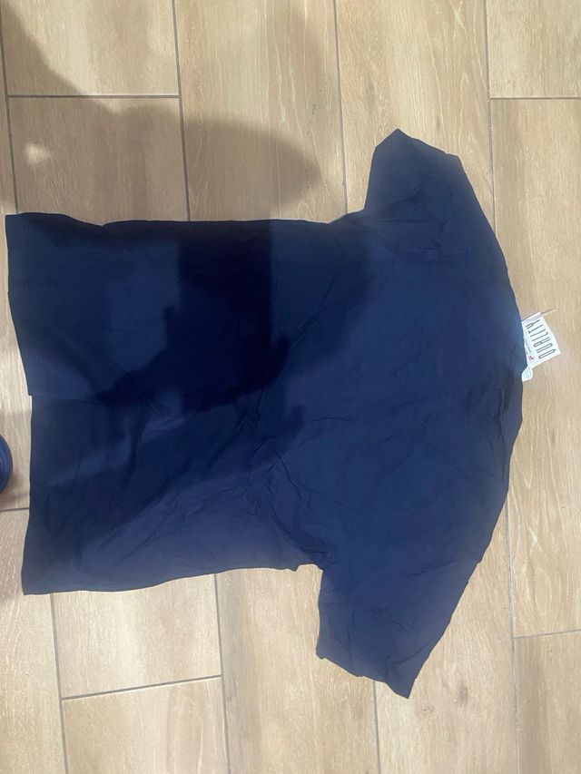 Polo Adidas azul con rayas