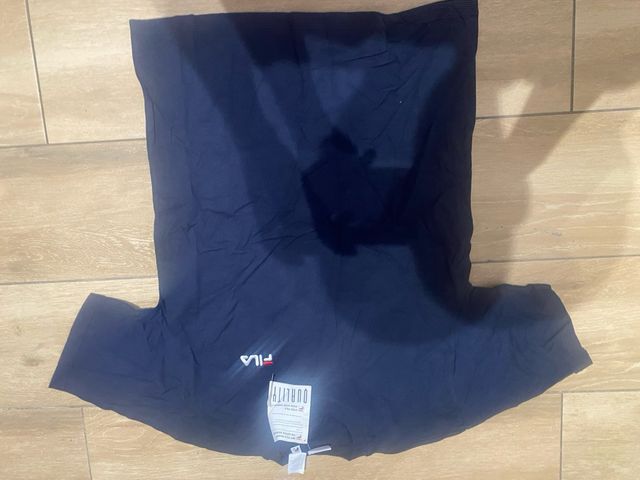 Polo Adidas azul con rayas