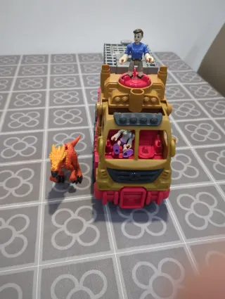 Camión Jurassic World con dinosaurio