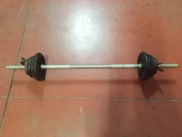 Barra de pesas con discos