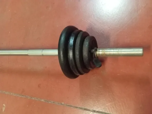 Barra de pesas con discos