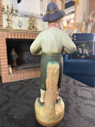 Figura antigua niño con macetas mide 40cm