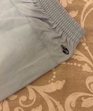 Adidas track pants pastel talla 38 tejido técnico