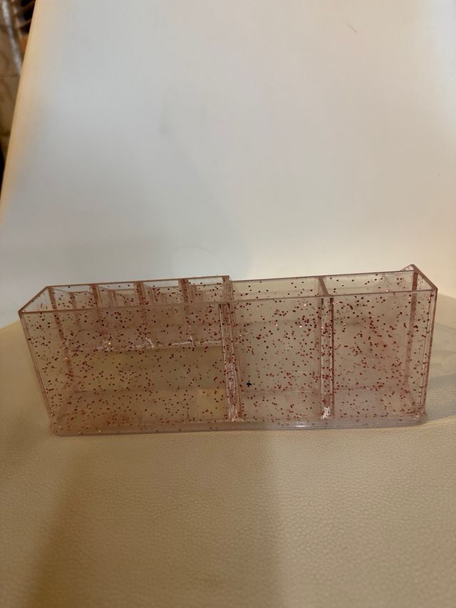 Organizador de maquillaje con brillos