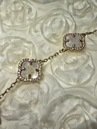 Bracciale oro 3 fiori madreperla zirconi