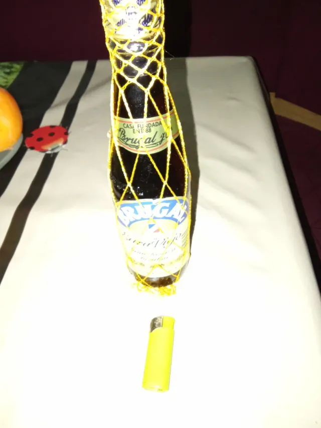 Bottiglia Brugal con rete dorata