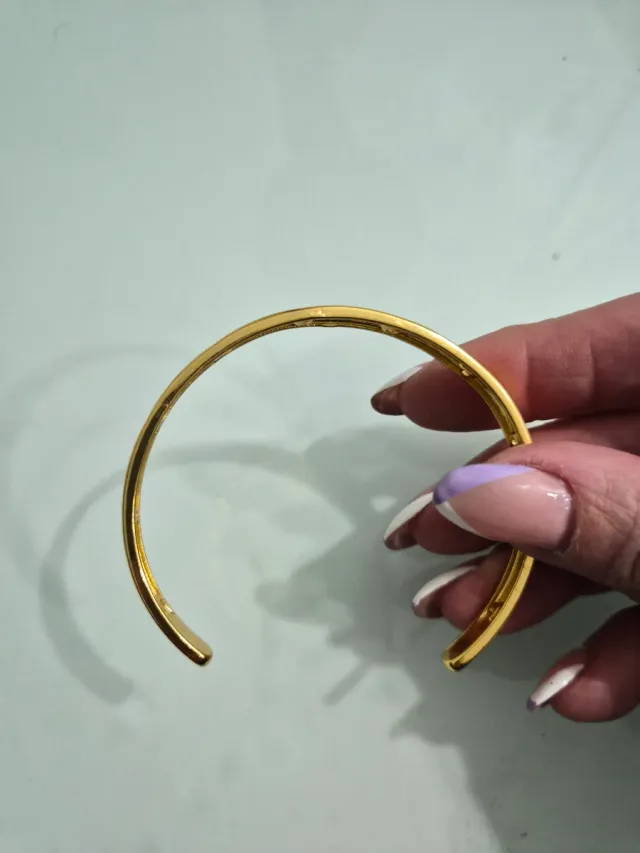 Pulsera chapada en oro con estrellas