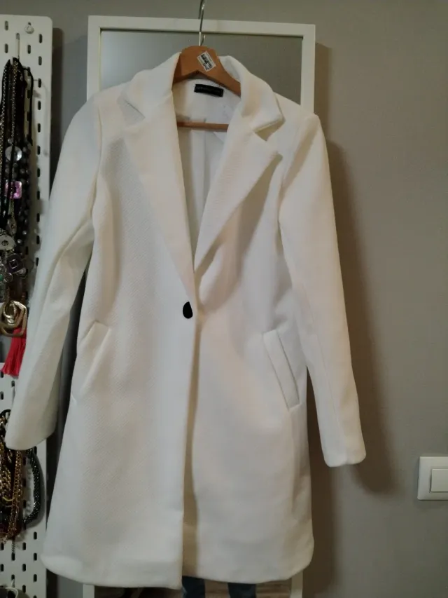 Abrigo blanco elegante