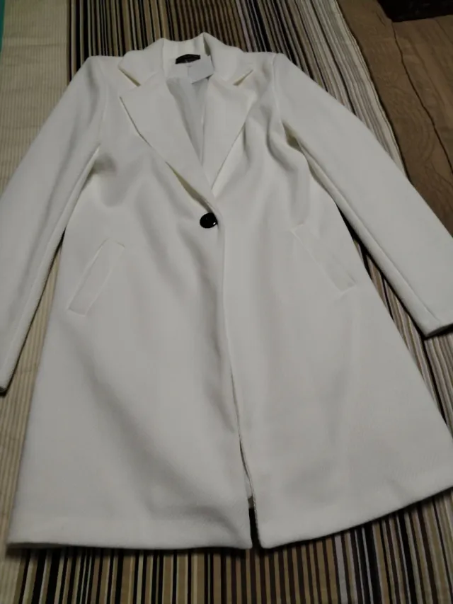Abrigo blanco elegante
