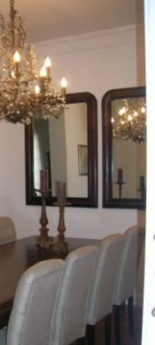 Dos espejos madera maciza.