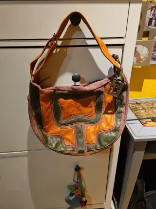 Bolso Caminatta tela y piel verde/naranja