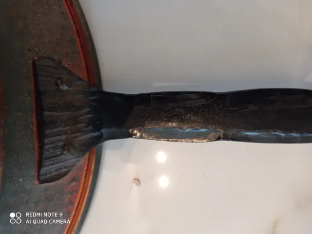 Orologio in rame martellato con manico