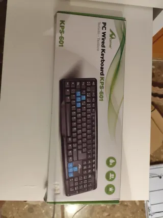 Teclado Aome KPS-601, con cable.